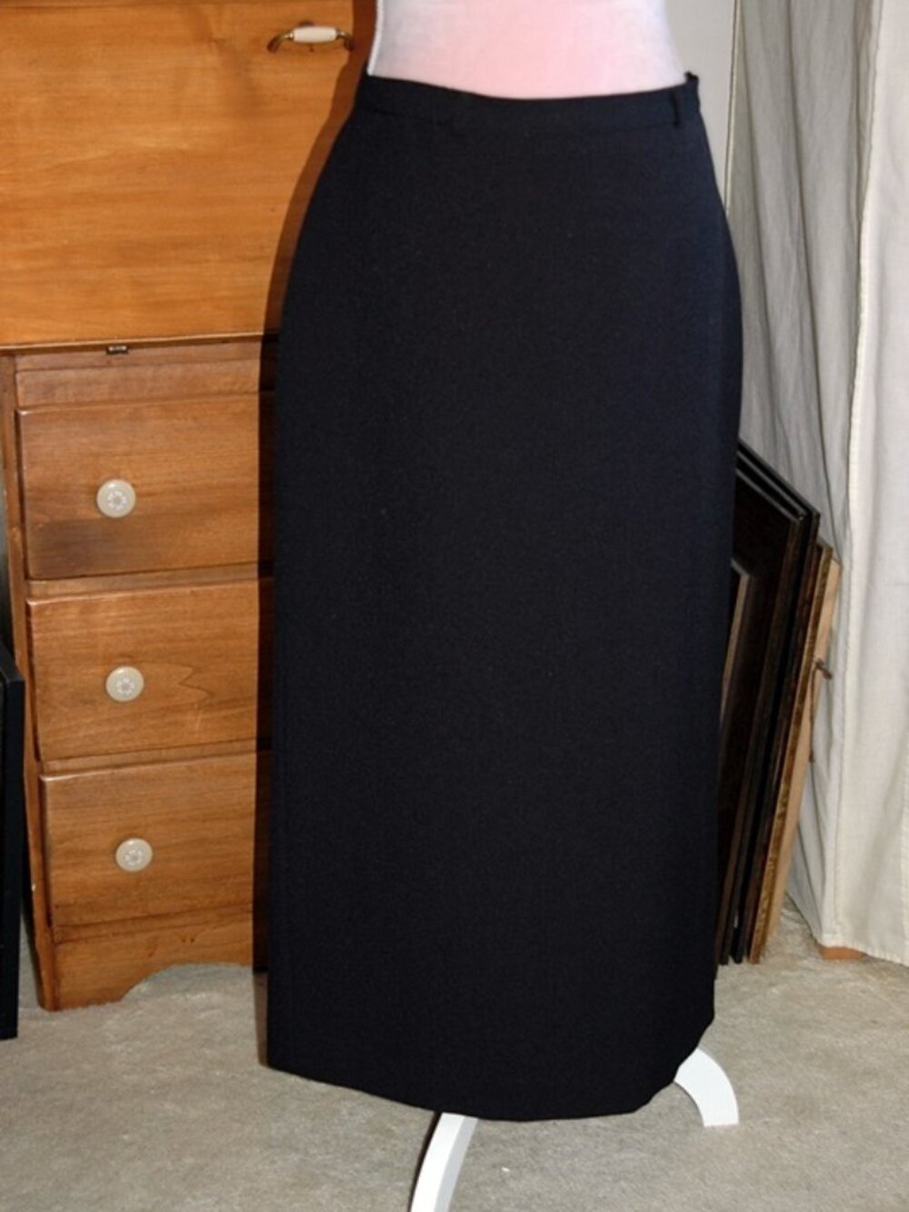 Size 9: Classic Black Midi Column Skirt.